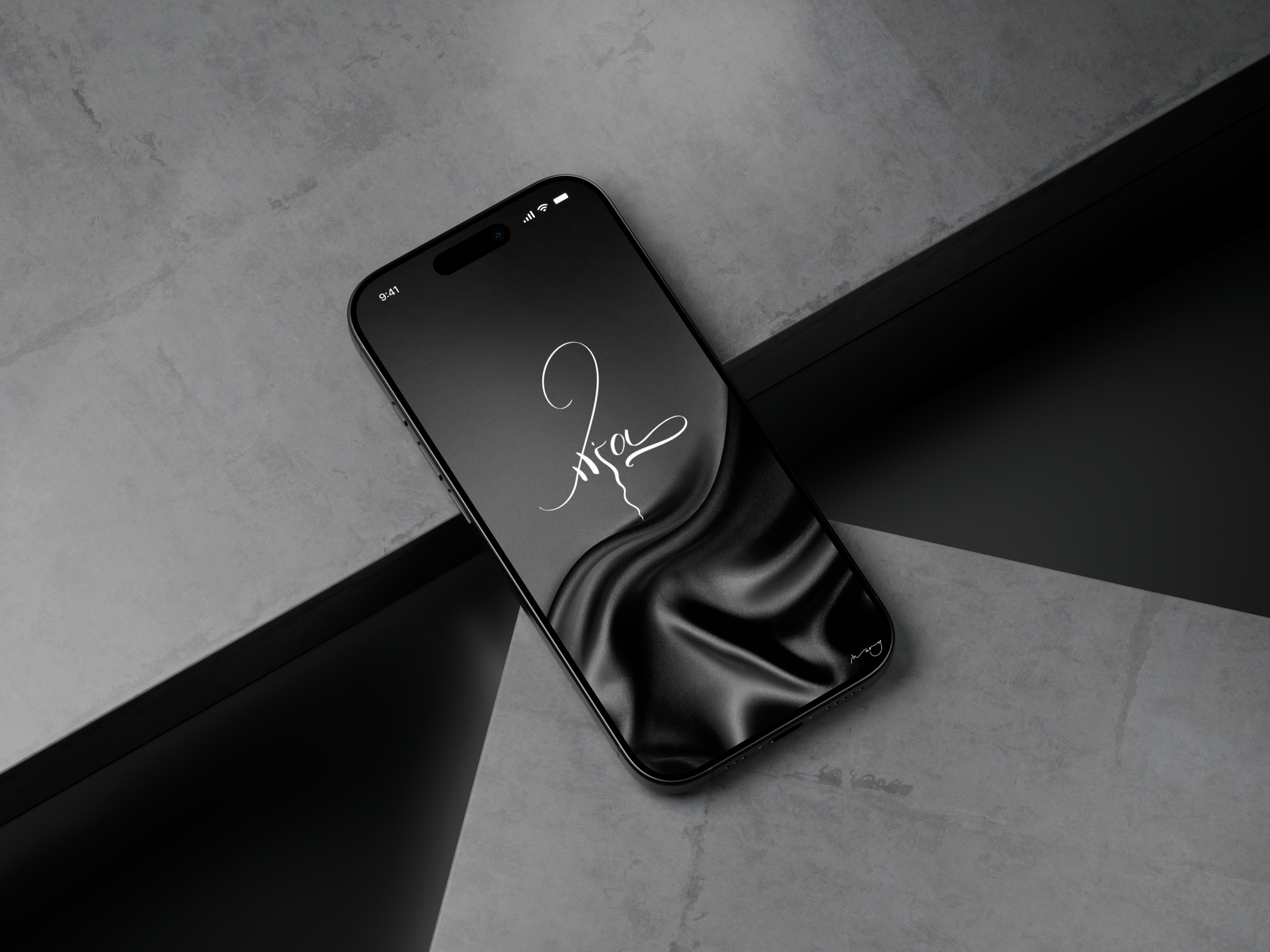 Black smartphone with the wallpaper on a lock screen with a calligraphy name Mia on it