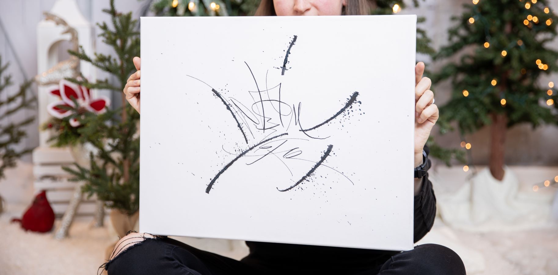 Artist holding the canvas with original calligraphy art No time for fancy