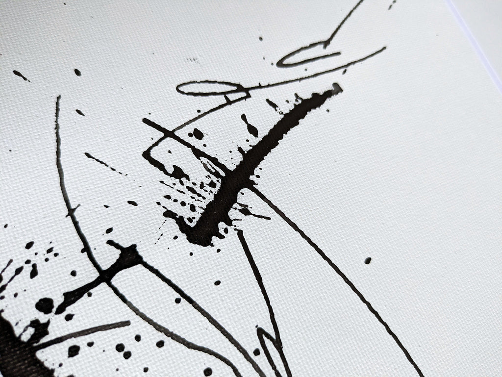 Detail of Cat-astrophe abstract calligraphy artwork in white and black by Mary Pavlova