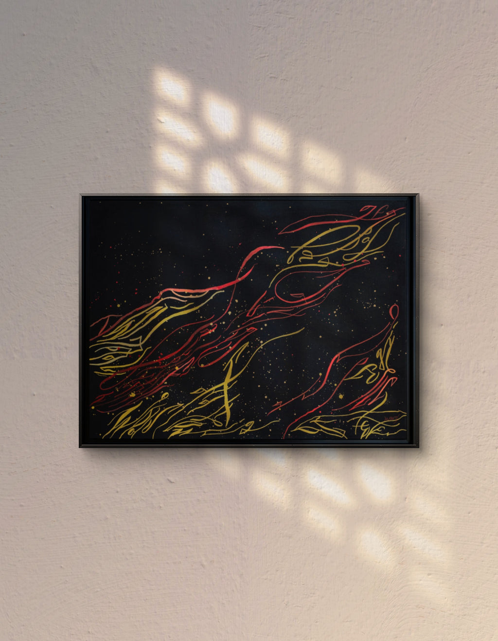 Flame of Frustration original abstract calligraphy artwork in black,red, and gold by Mary Pavlova on the wall in a warm light