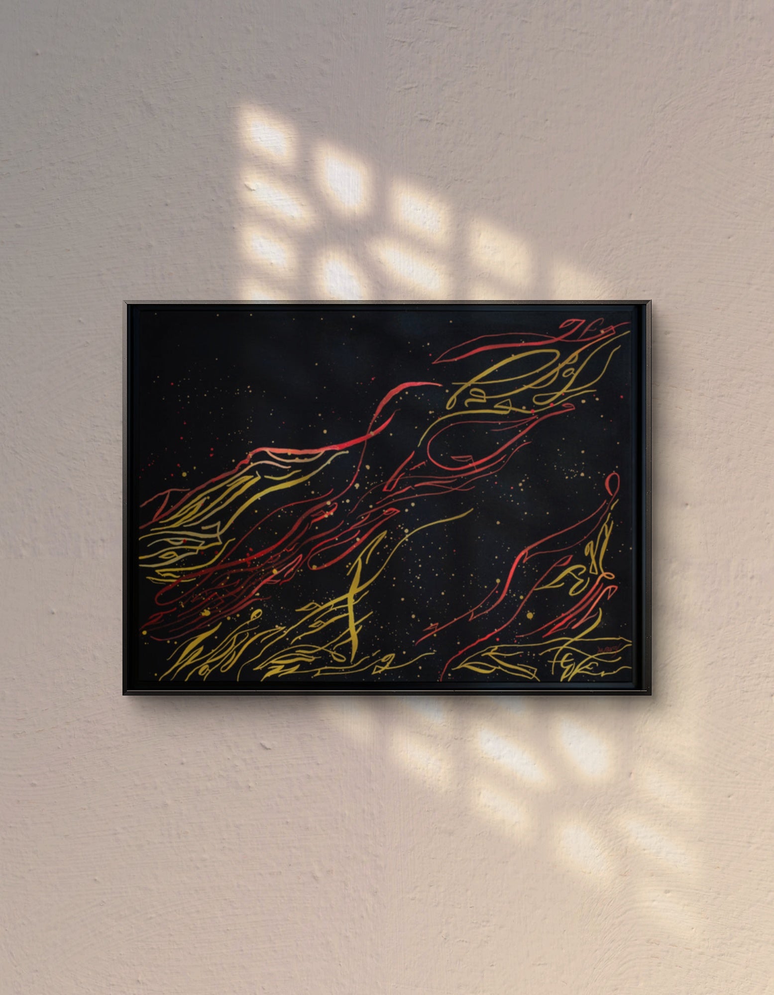 Flame of Frustration original abstract calligraphy artwork in black,red, and gold by Mary Pavlova on the wall in a warm light