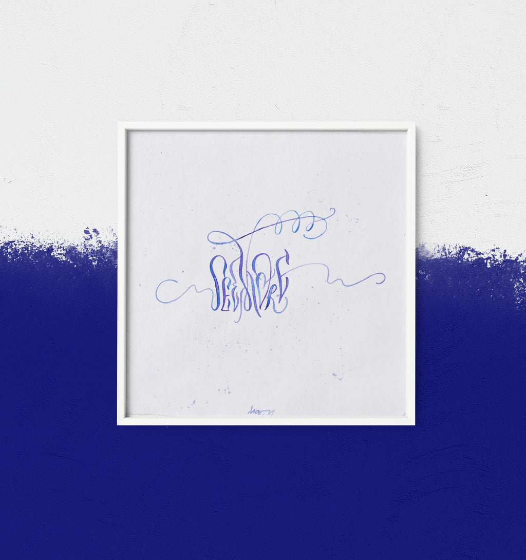 Framed abstract calligraphy artwork See More with blue text on a white background, placed against a blue and white gradient wall.