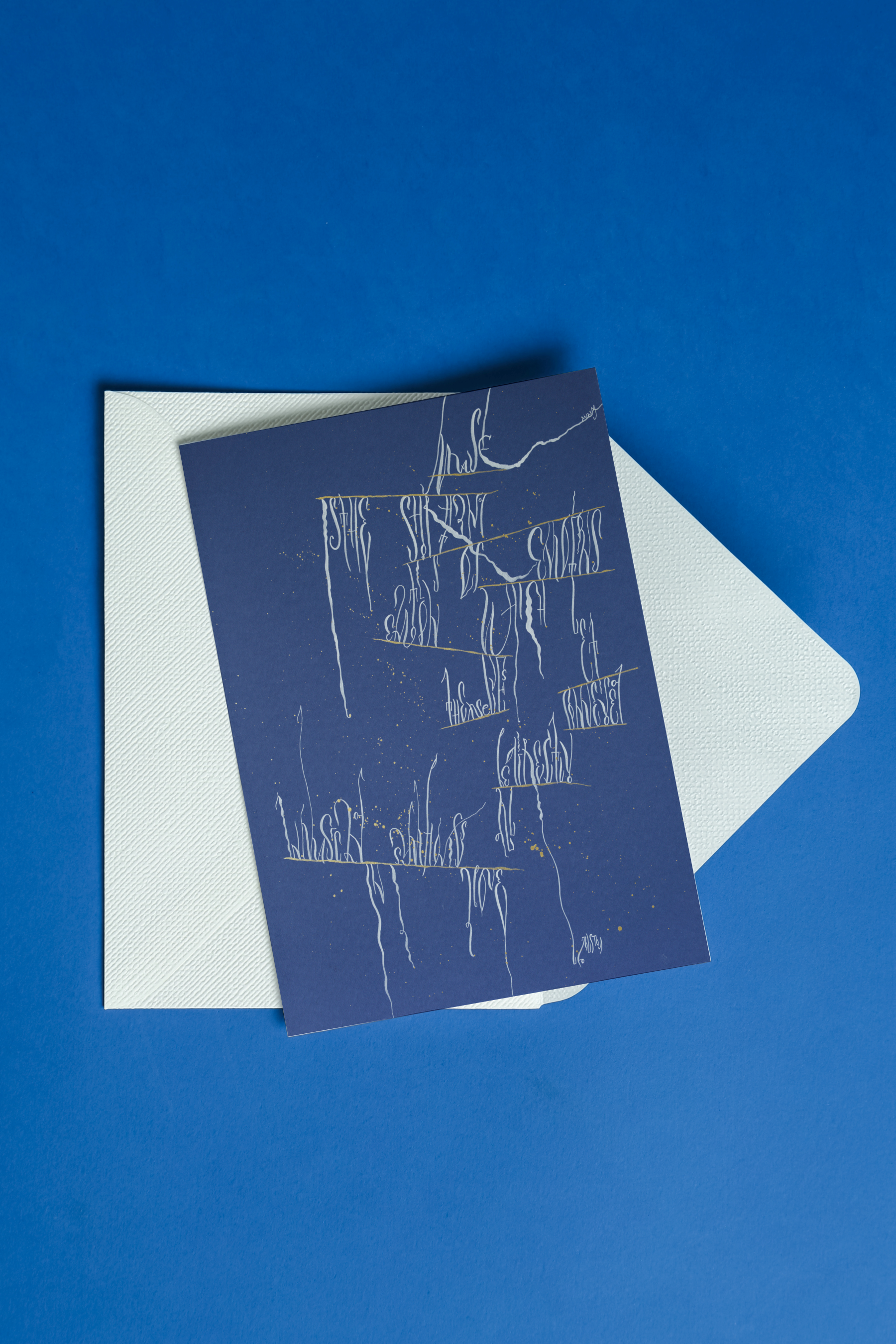 Blue card with Flow of music artwork on a white envelope against a blue background