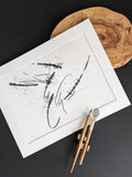 Love is in The Chair original abstract calligraphy artwork by Mary Pavlova in white and black