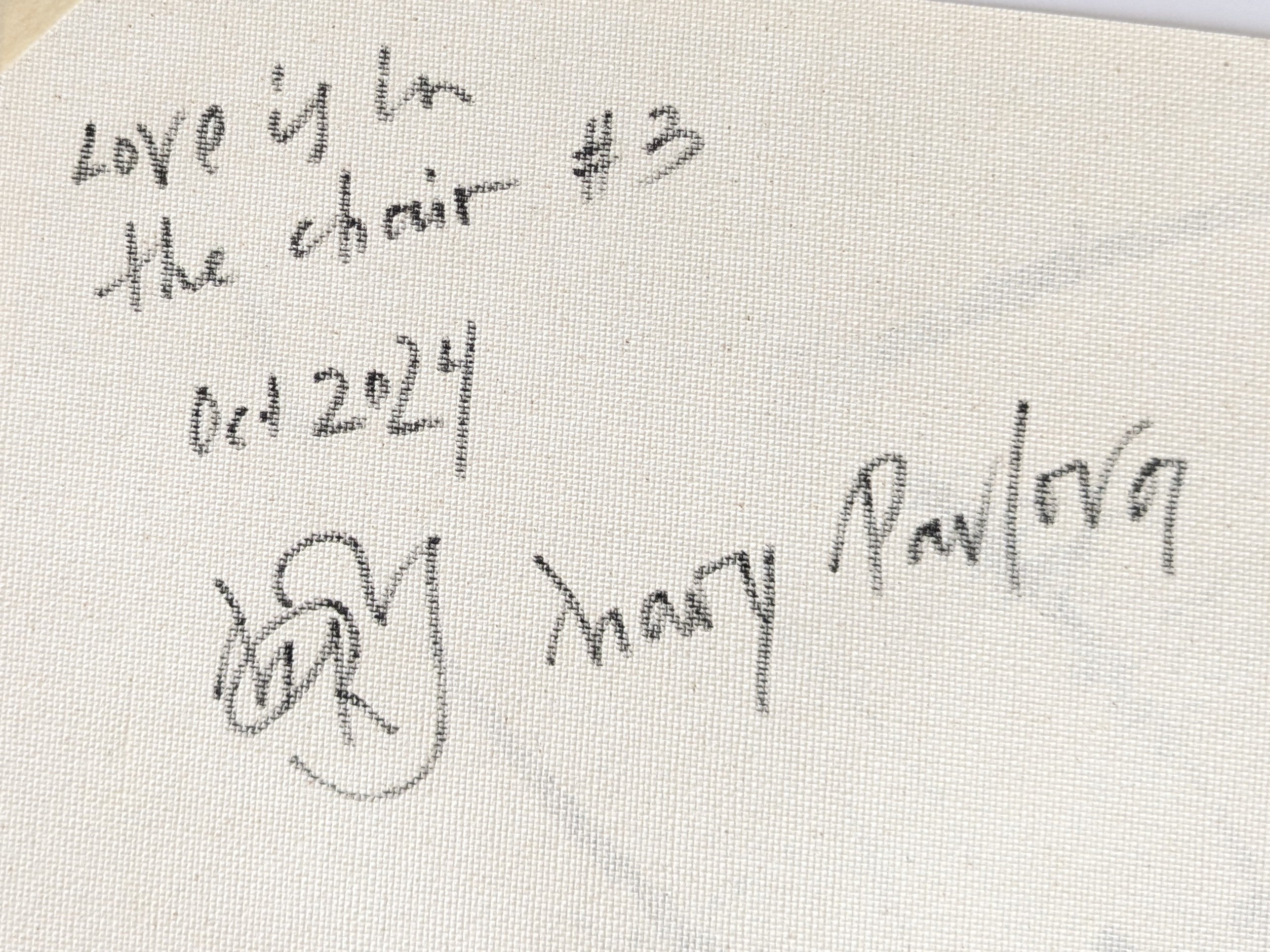 Signature and date on the reverse of Love is in the Chair artwork by Mary Pavlova
