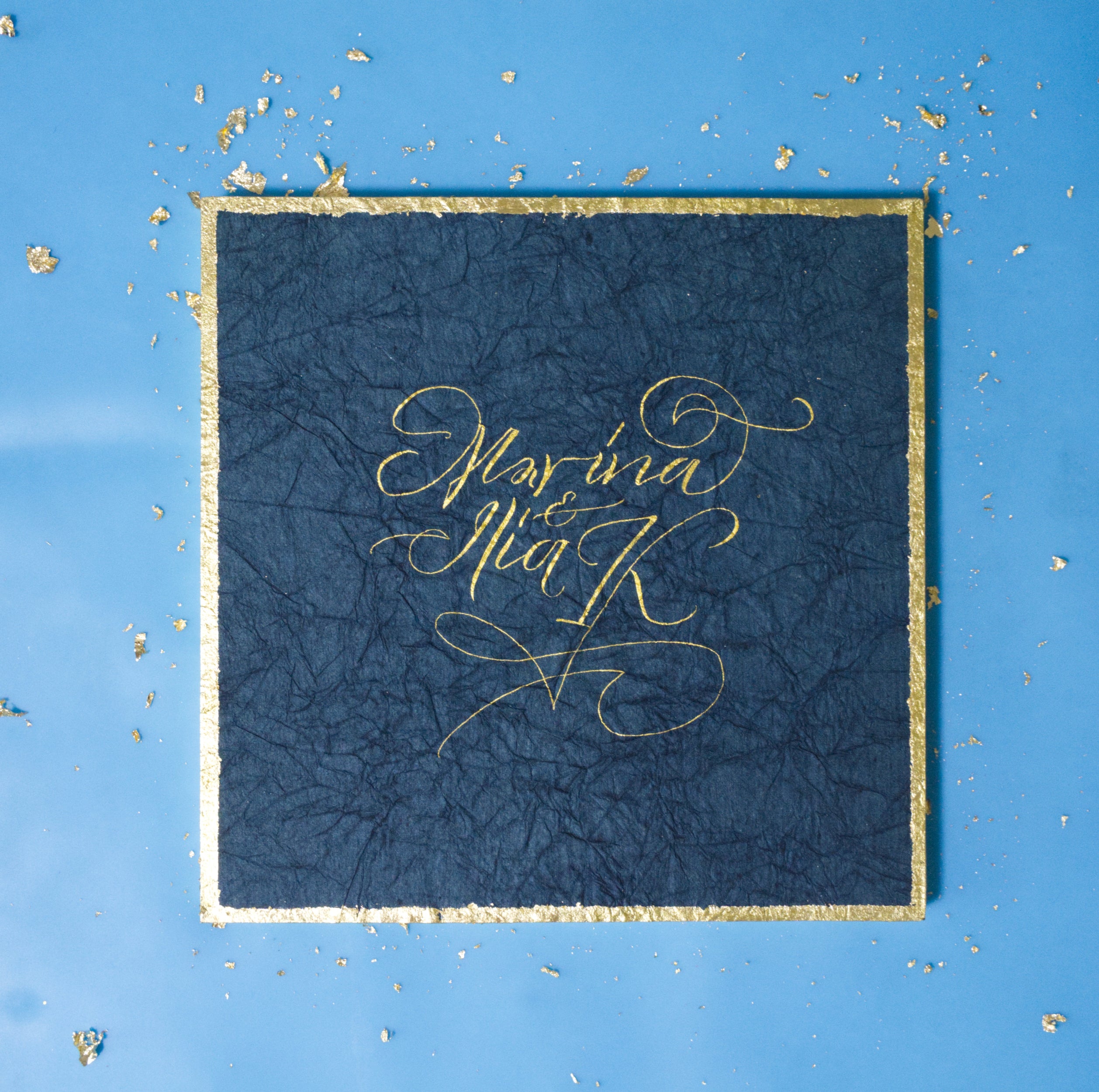 Personilized art on blue textured paper with gold text and gold fake frame 