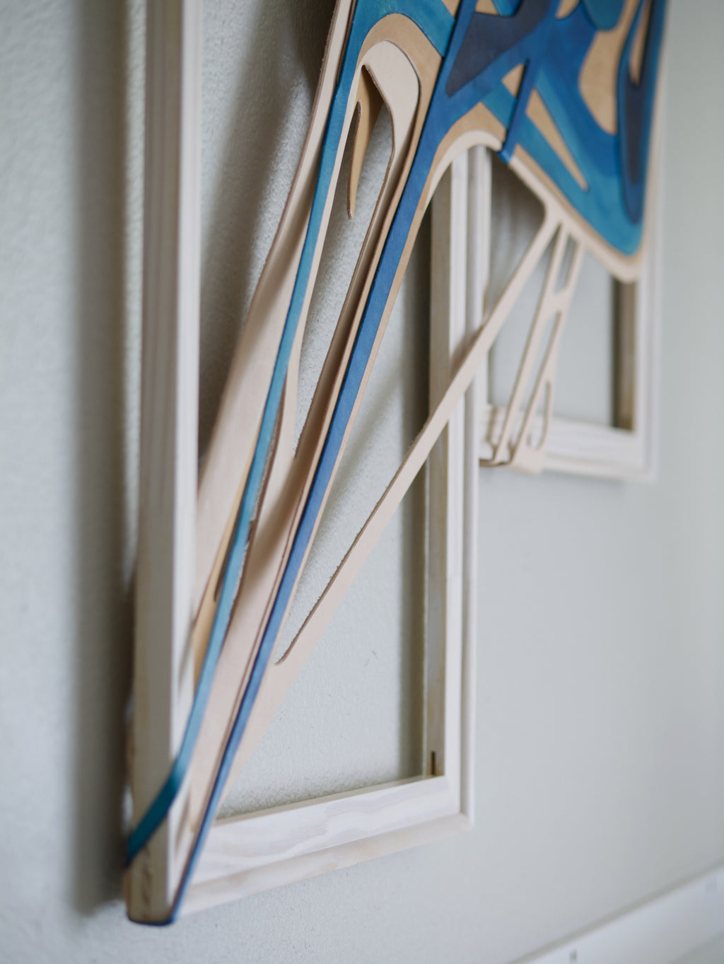 Detail of Signatrue stlye original abstract text-based artwork in blue and beige by Mary Pavlova