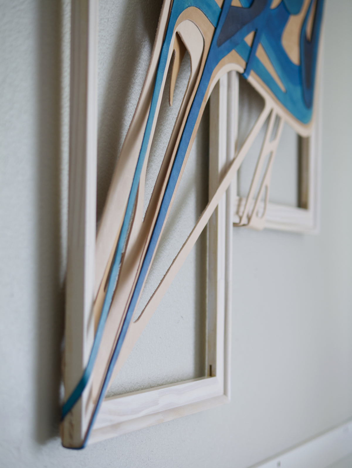 Detail of Signatrue stlye original abstract text-based artwork in blue and beige by Mary Pavlova