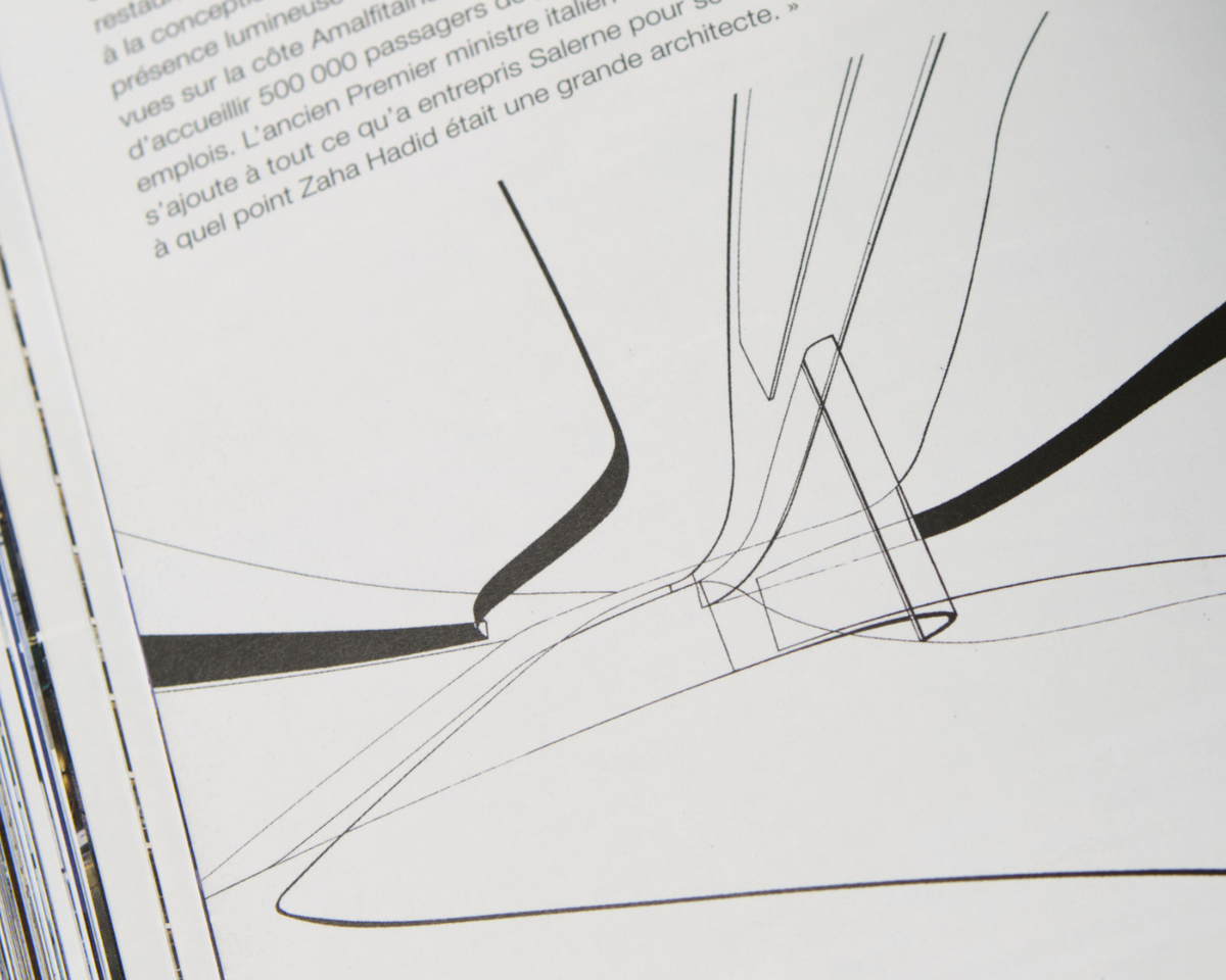 Zaha Hadid architecture book open to black-and-white linear architectural drawings, an influence on Mary Pavlova’s visual language.