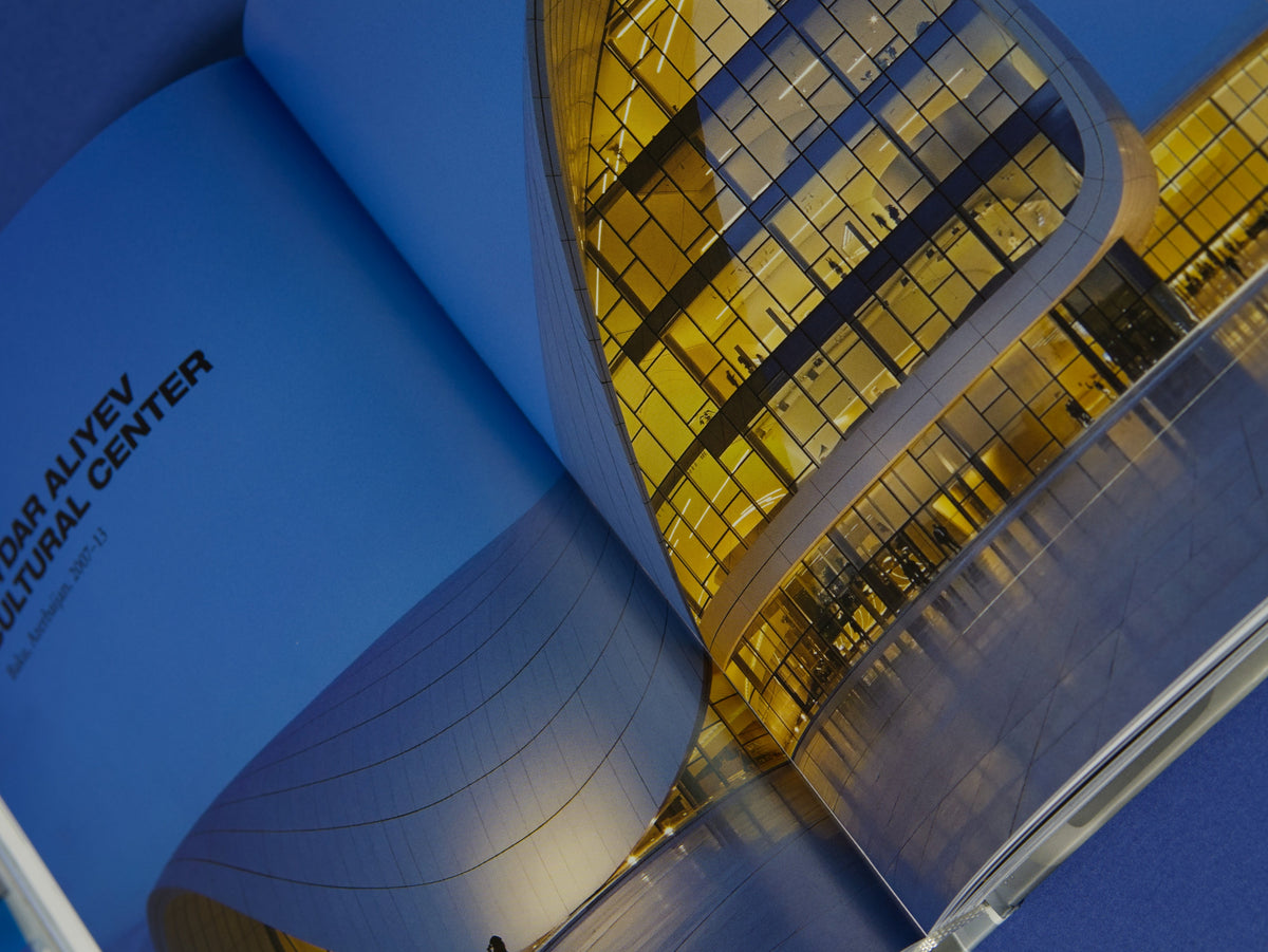 Zaha Hadid architecture book featuring the Heydar Aliyev Center, an example of the flowing architectural forms that influence Mary Pavlova’s visual language.
